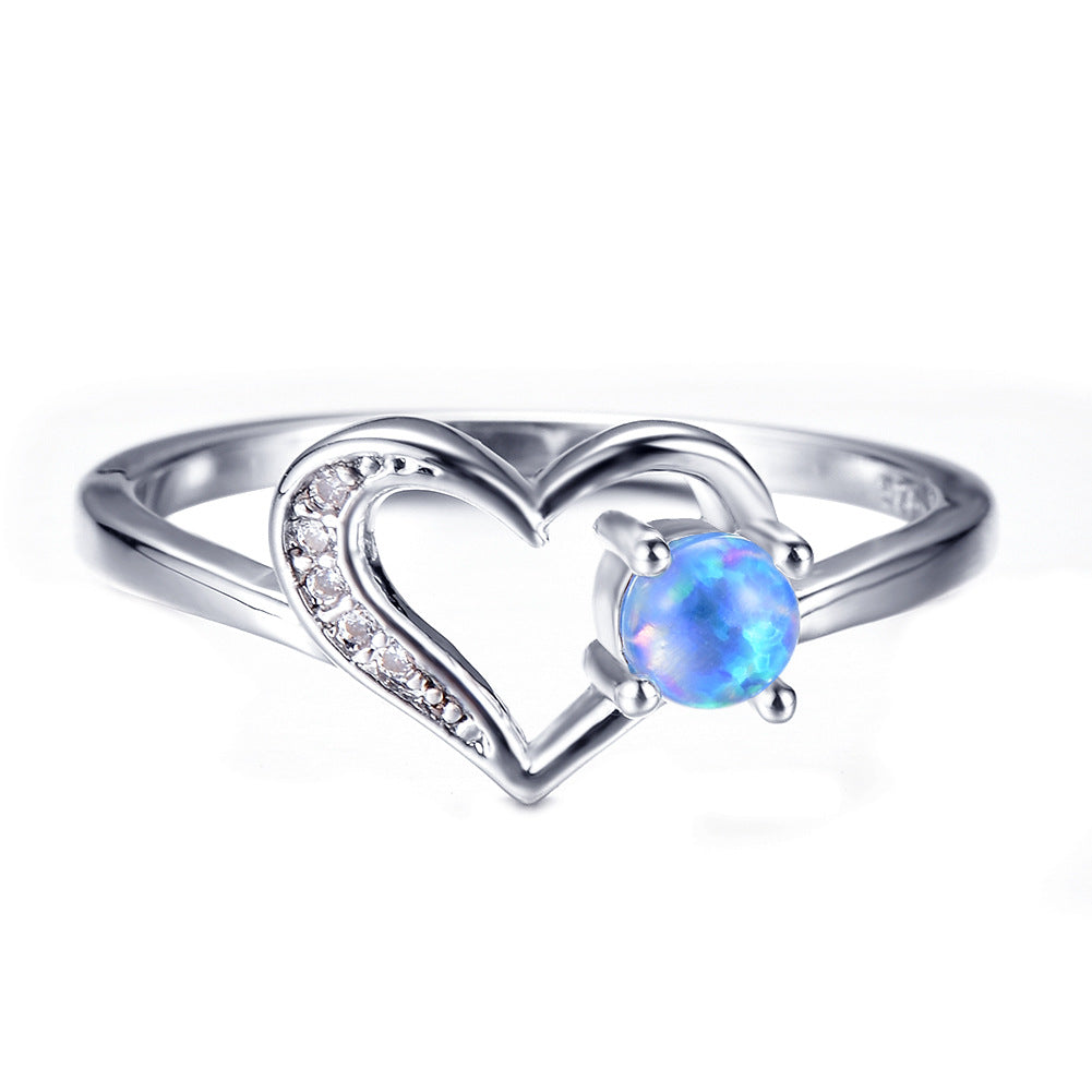 Damen Ring mit herzförmigem Design und funkelndem Opal Shop Nory