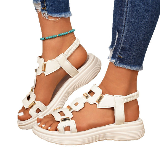 Damen Plateausandalen mit ergonomischer luftgepolsterter Sohle und dekorativen Metallapplikationen Shop Nory