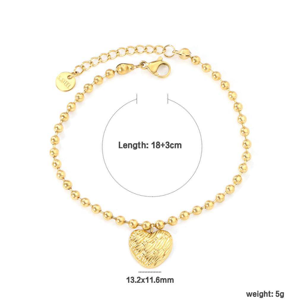 Damen Armband mit feinem Herzanhänger und eleganten Perlen Shop Nory