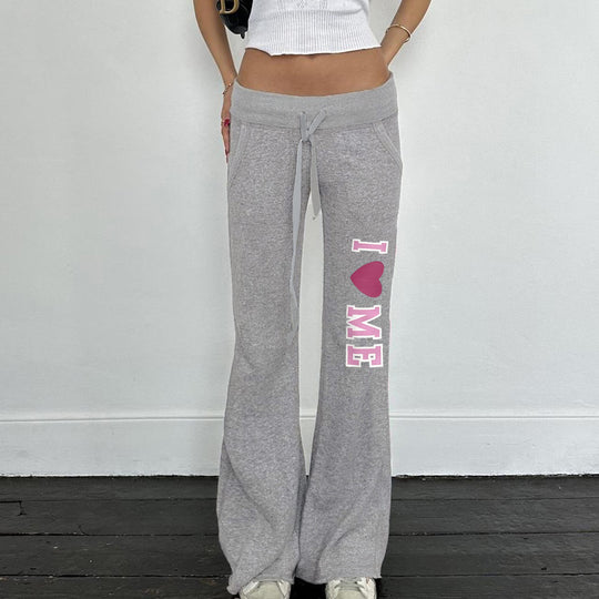 Damen nan weiche Flared-Jogginghose mit Kordelzug, Eingrifftaschen und auffälligem Love-Print Shop Nory