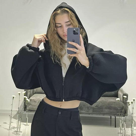 Damen kurzes Oversize-Kapuzen-Sweatshirt mit Reißverschluss, Ballonärmeln und elastischem Saum Shop Nory