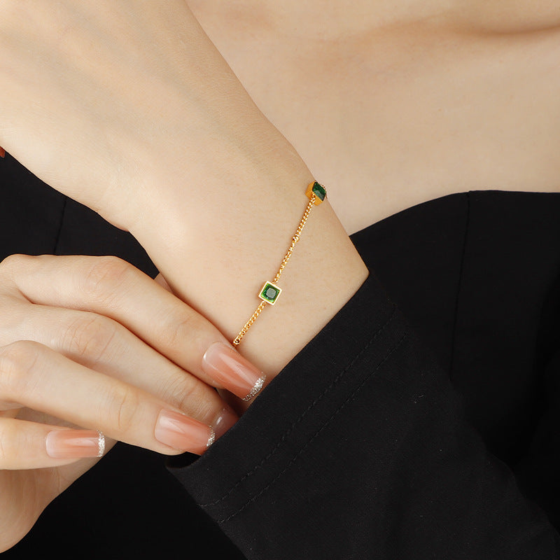 Damen filigranes Armband mit quadratischen Edelsteinen Shop Nory