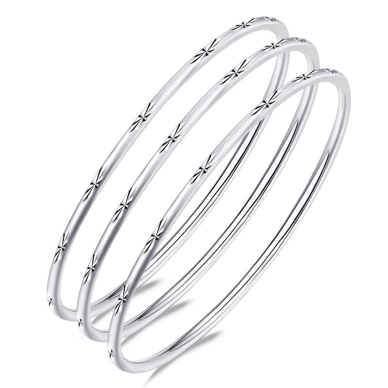 Damen Armreif-Set mit elegantem, filigranem Design und edlen Zirkonia-Details Shop Nory
