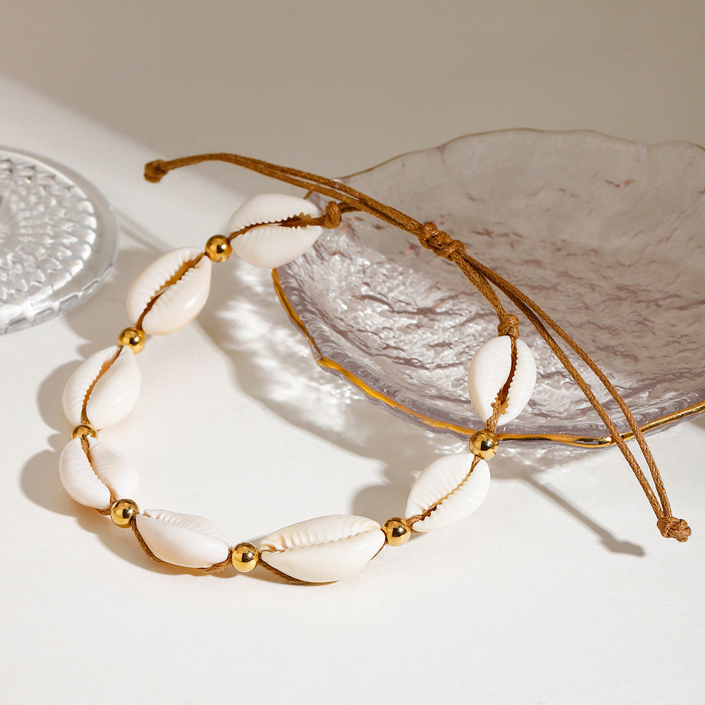Damen Armband mit Muschel- und goldenen Akzenten Shop Nory