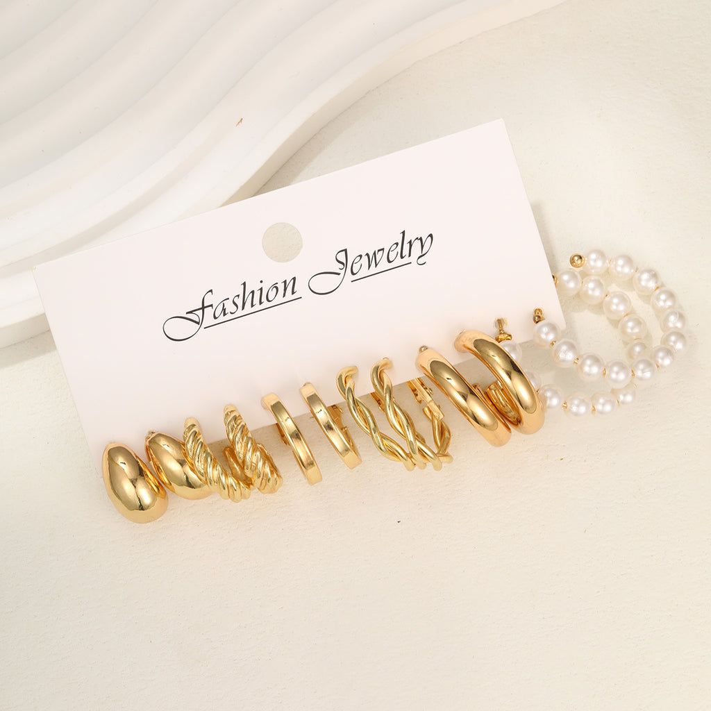 Damen Ohrstecker-Set mit eleganten Gold- und Perlenakzenten Shop Nory