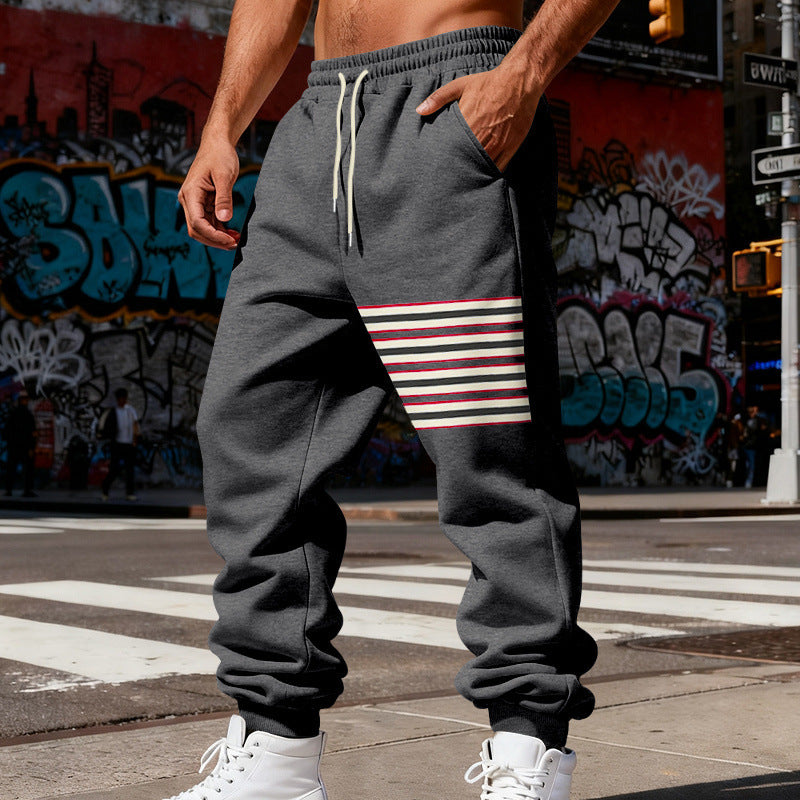 Herren Relaxed-Fit Jogginghose mit seitlicher Streifenapplikation, Kordelzug & gerippten Bündchen Shop Nory