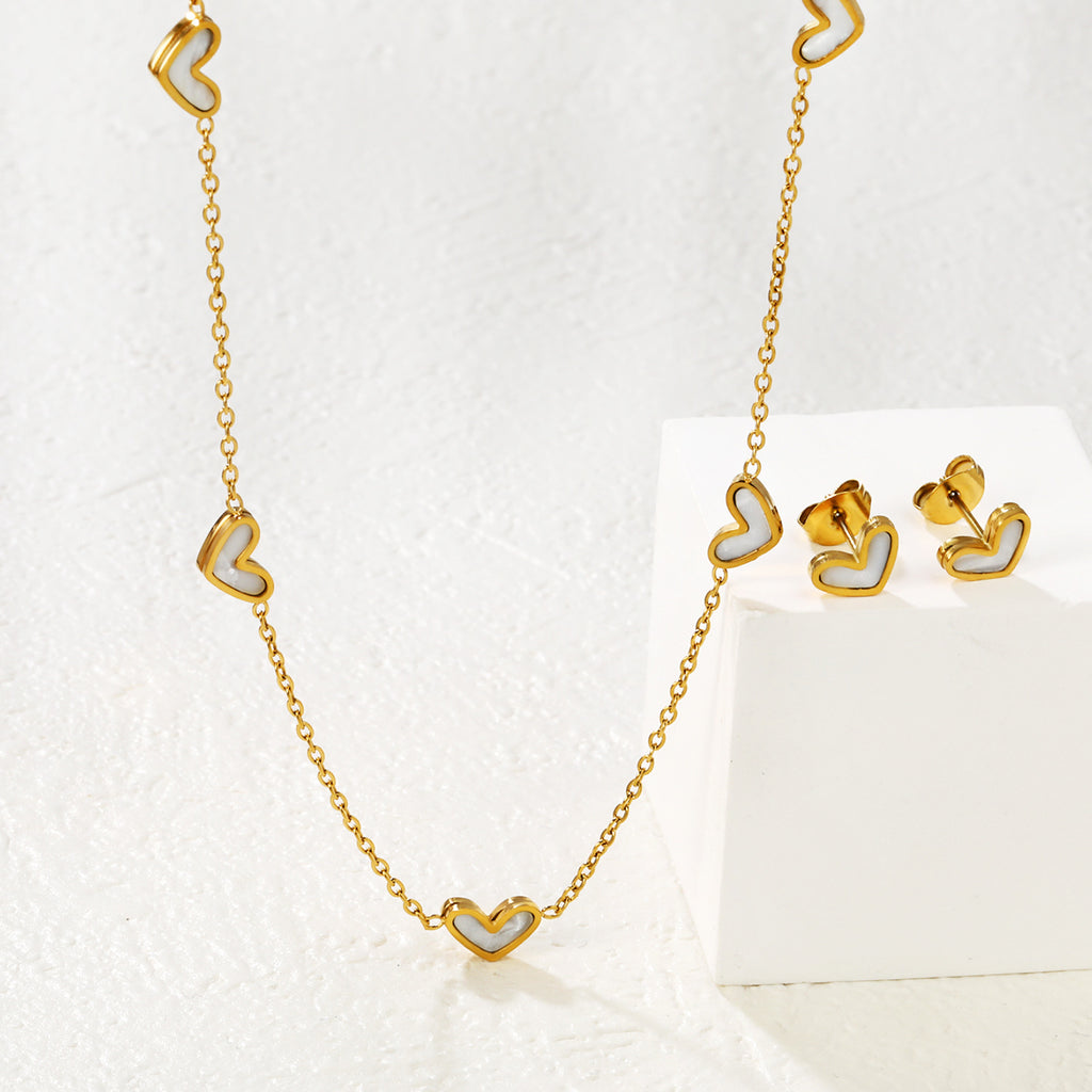 Damen Schmuckset mit herzförmigen Anhängern und funkelnden Zirkonia Shop Nory