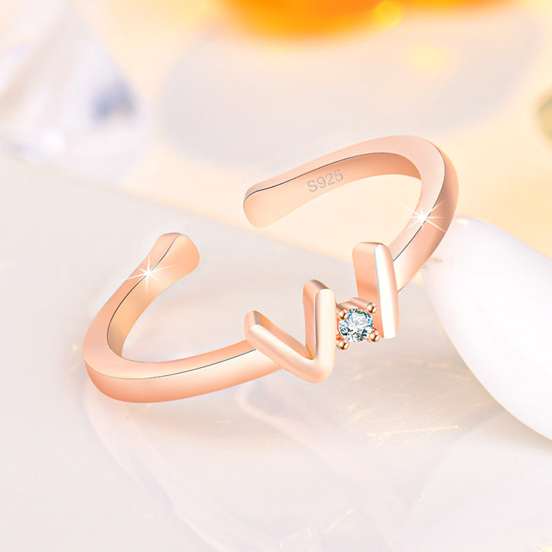 Damen Offener Ring mit geschwungenem Design und funkelndem Zirkonia-Besatz Shop Nory