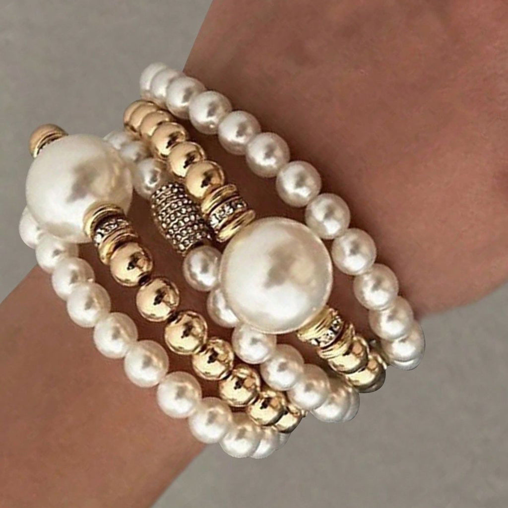 Damen Perlenarmband mit eleganten goldenen Akzenten Shop Nory