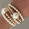 Damen Perlenarmband mit eleganten goldenen Akzenten Shop Nory