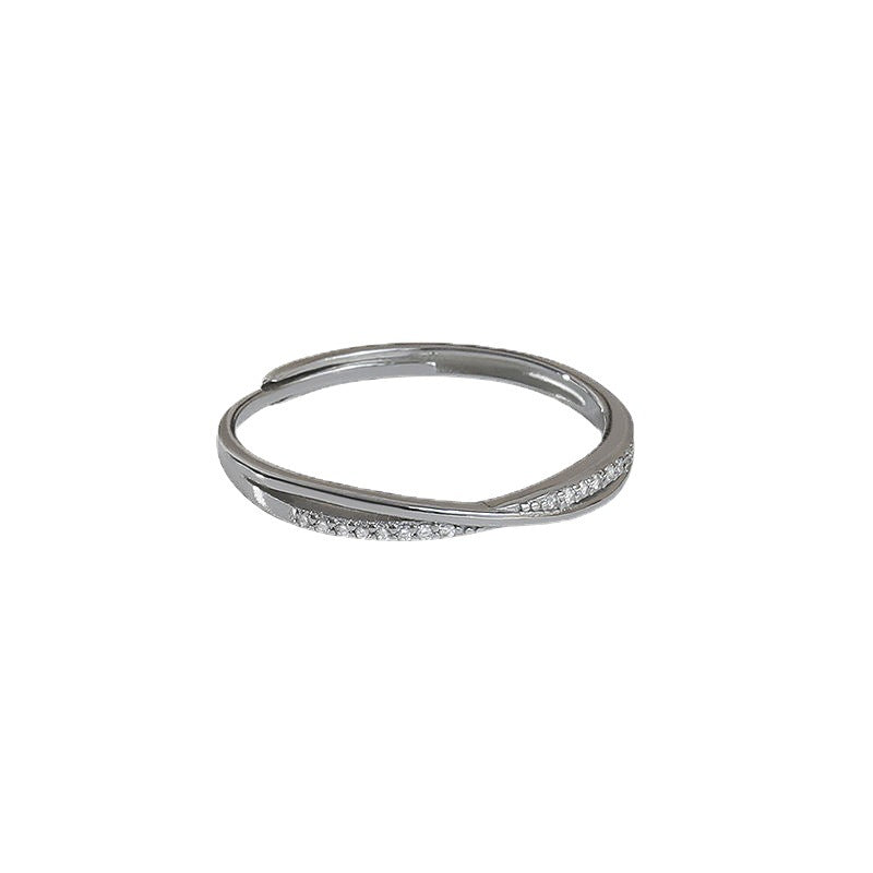 Damen filigraner Ring mit geschwungenem Design und funkelnden Zirkonia Shop Nory