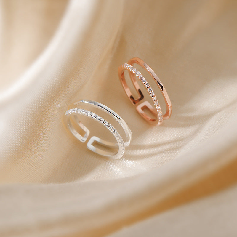 Damen designierter Ring mit funkelnden Zirkonia und elegantem Doppelband Shop Nory