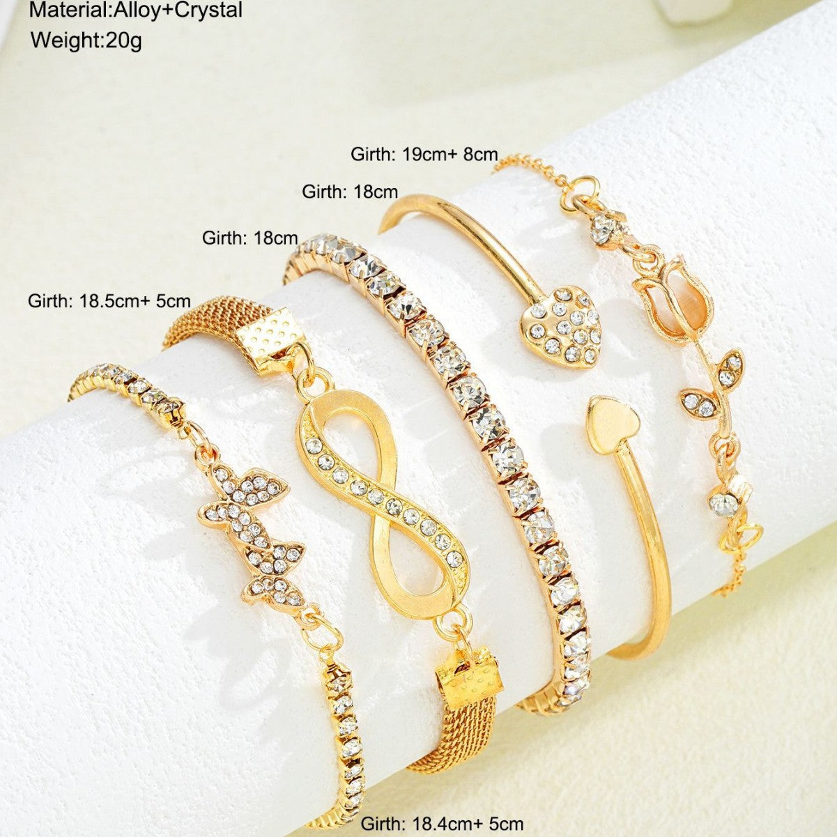Damen Armband-Set mit funkelnden Zirkonia und modischen Anhängern Shop Nory
