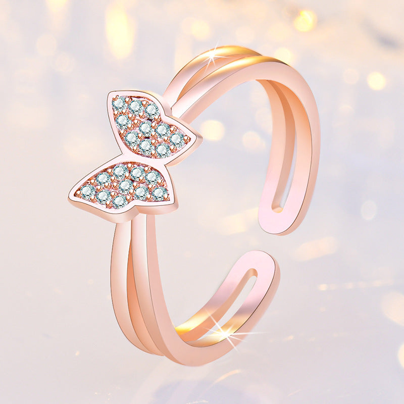 Damenring mit filigranem Schmetterlingsdesign und funkelnden Zirkonia Shop Nory