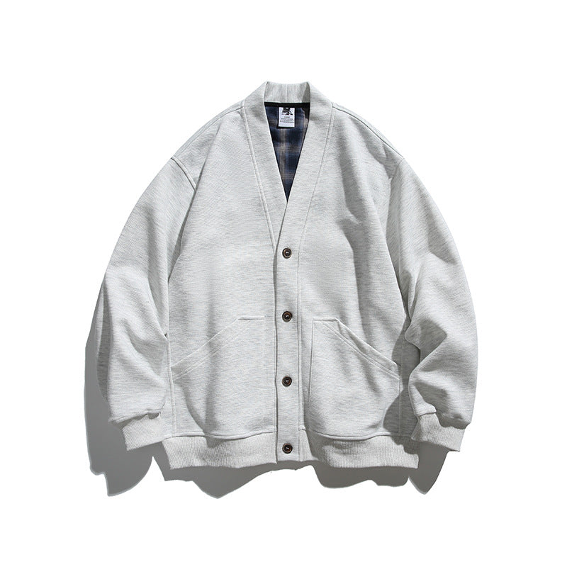 Unisex Boxy-Cardigan-Jacke mit V-Ausschnitt, aufgesetzten Taschen und kariert gefüttertem Innenfutter Shop Nory
