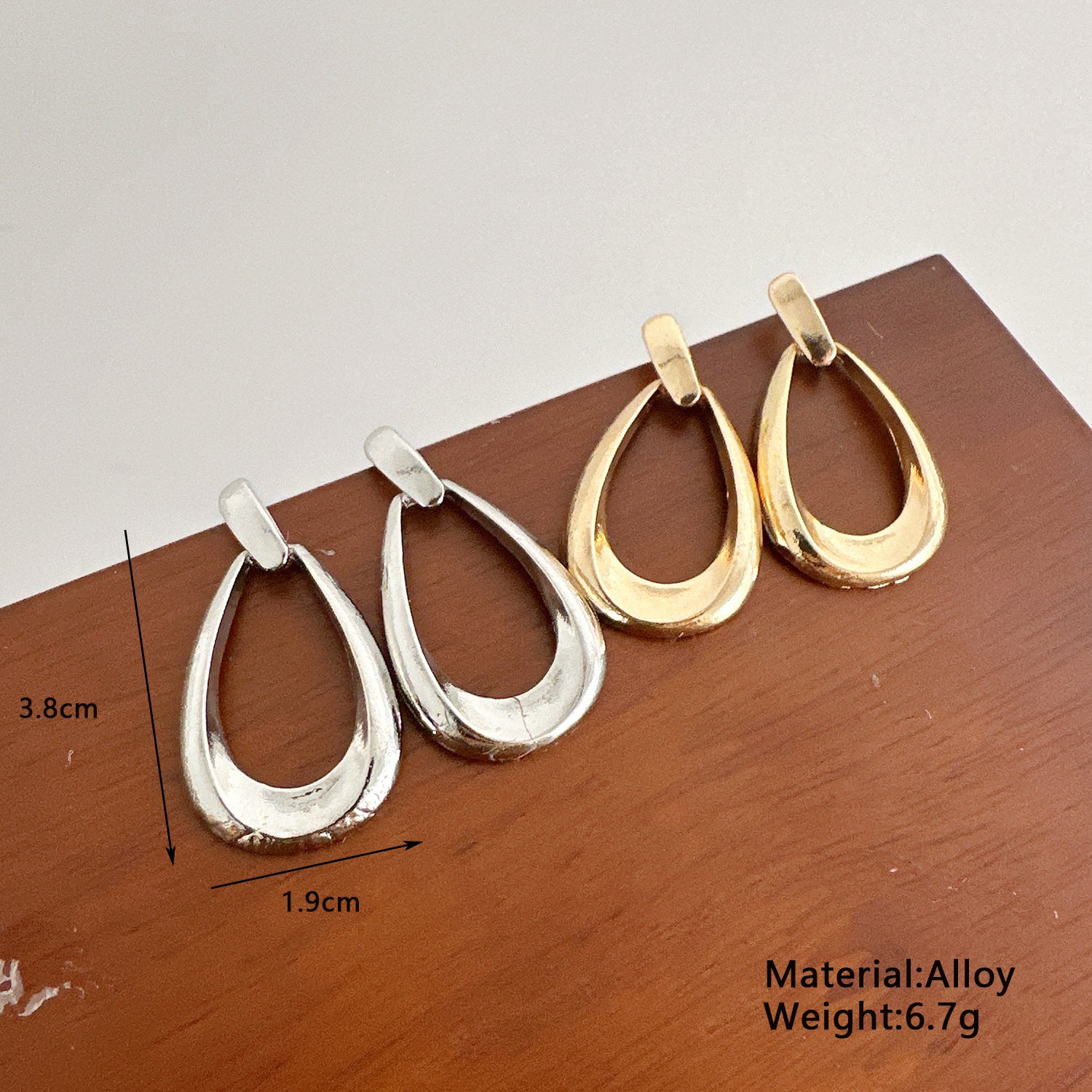 Damen Creolen mit einzigartigem geschwungenem Design Shop Nory