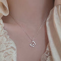 Damen Halskette mit filigranem Schmetterlingsanhänger und funkelnden Zirkonia Shop Nory
