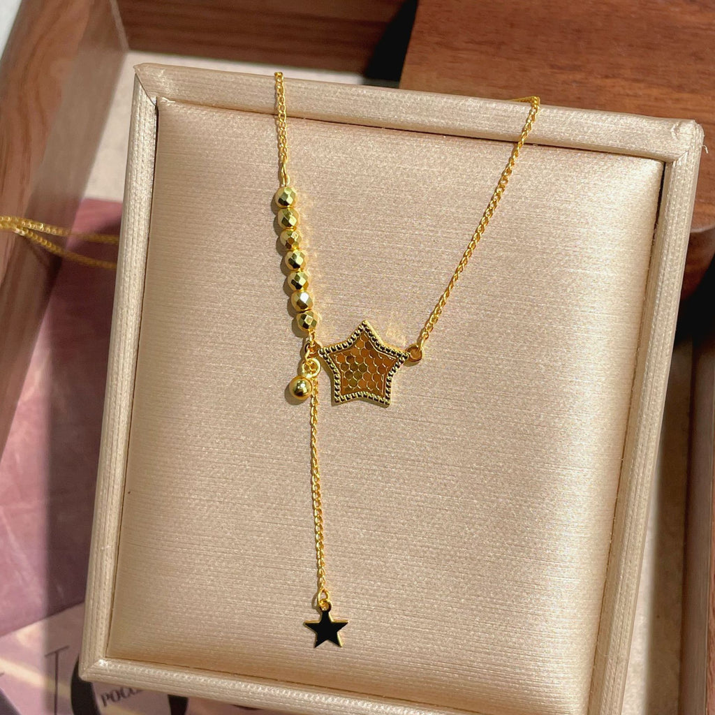 Damen Kette mit funkelndem Sternen-Anhänger und eleganten Akzenten Shop Nory