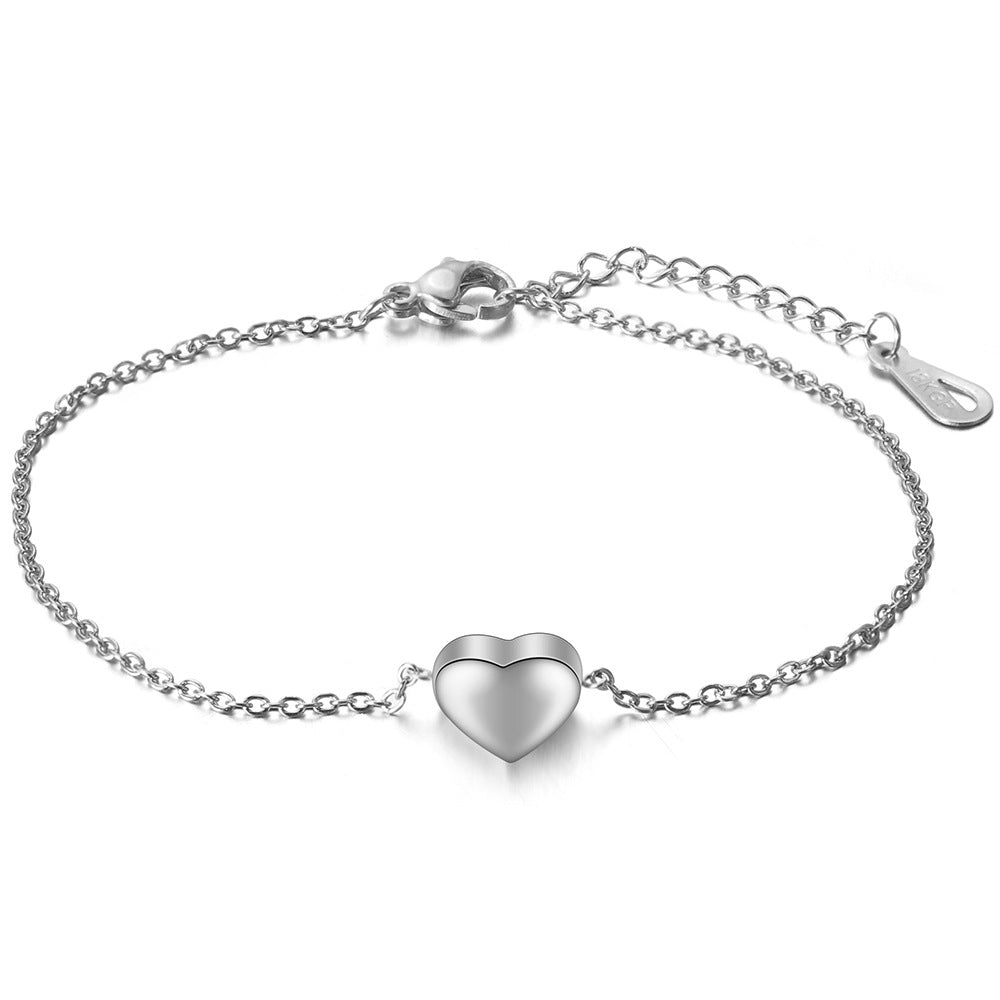Damen Armband mit herzförmigem Anhänger und filigranem Design Shop Nory