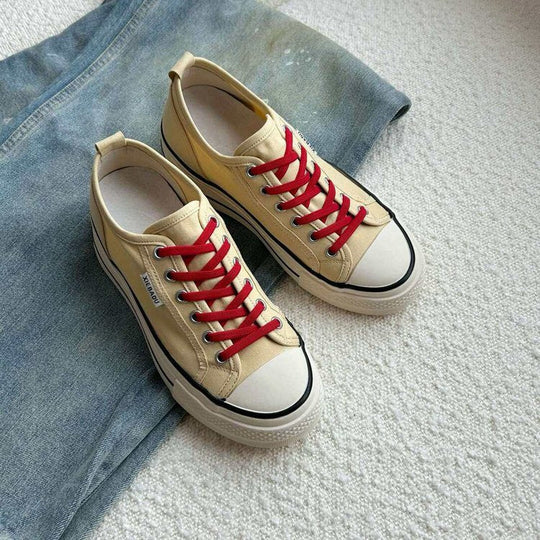 Damen modische Canvas-Sneaker mit kontrastierenden Schnürsenkeln und leichtem Sohlenprofil
