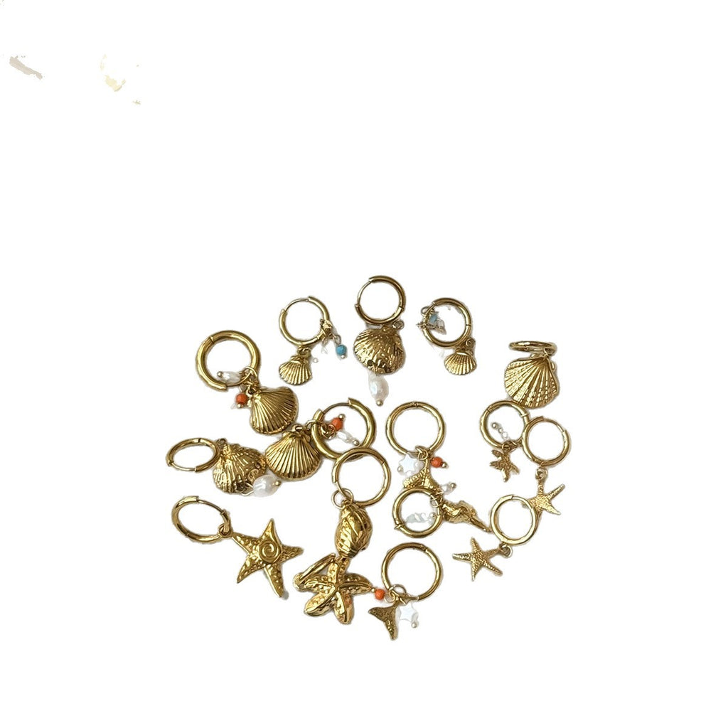 Damen Goldene Ohrringe mit Muschel-Design und Zirkonia Akzenten Shop Nory