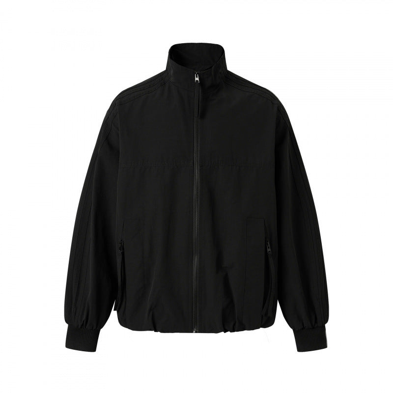 Unisex Leichte Boxy-Outdoorjacke im Trackstil mit hohem Stehkragen, Reißverschlusstaschen und elastischem Saum Shop Nory