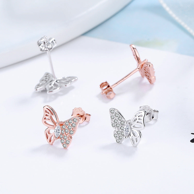 Damen Ohrstecker im eleganten Schmetterlingsdesign mit funkelnden Zirkonia Shop Nory