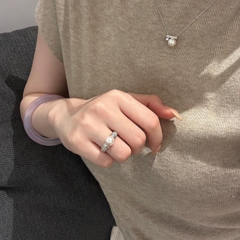 Damen Ring mit elegantem Perlen-Motiv und funkelnden Zirkonia Shop Nory