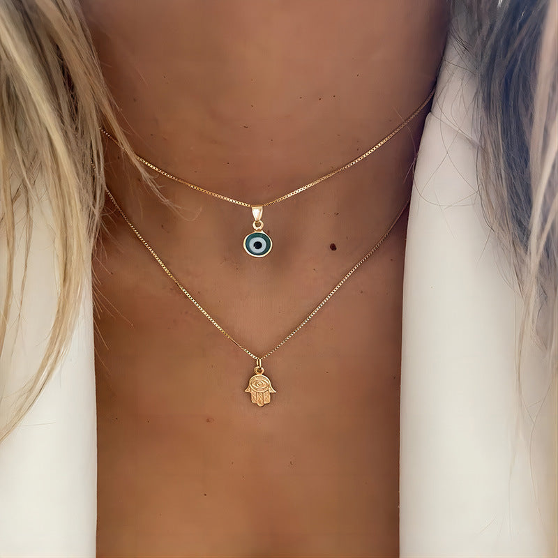 Damen Halskette Set mit schützendem Auge und Handanhänger Shop Nory