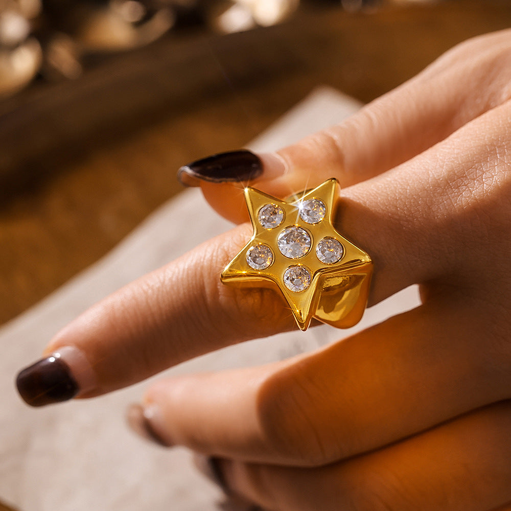 Damen sternförmiger Ring aus Titan mit Zirkonen Shop Nory