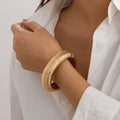 Damen stilvoller Armreif aus hochwertigem Metall mit elegantem Design Shop Nory