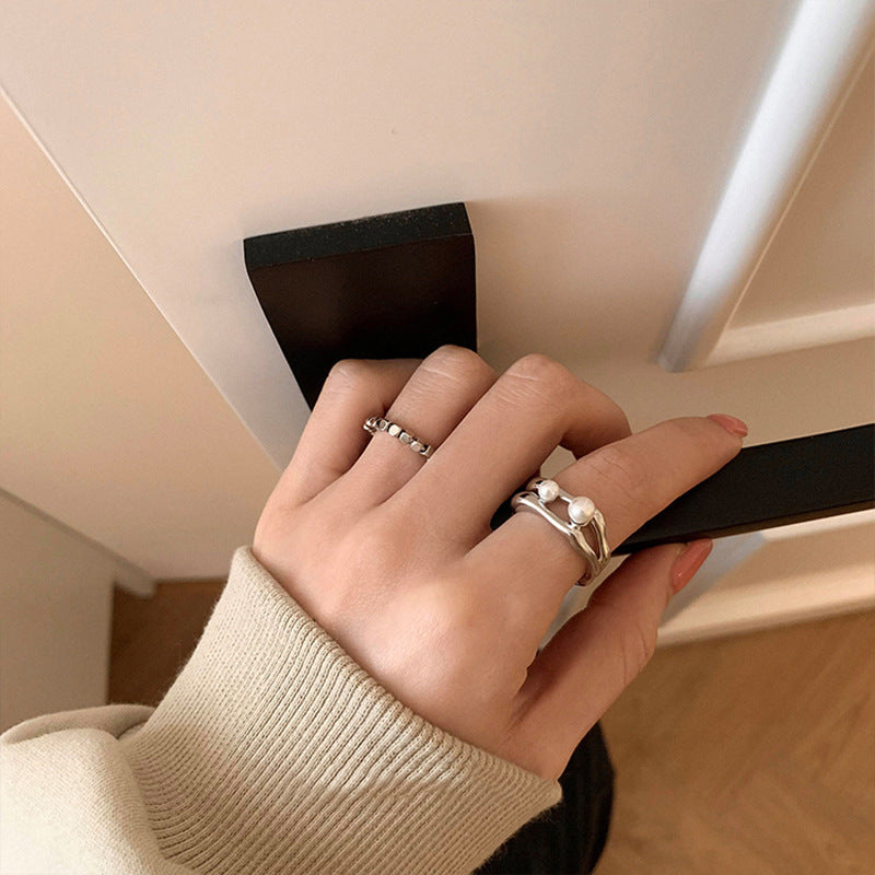Damen Offener Ring mit filigranem Design und eleganten Perlen Shop Nory
