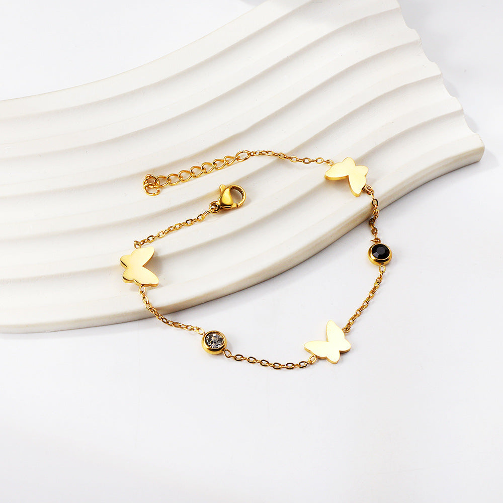 Damen edles Armband mit filigranen Schmetterlingsanhängern und Kristallakzenten Shop Nory
