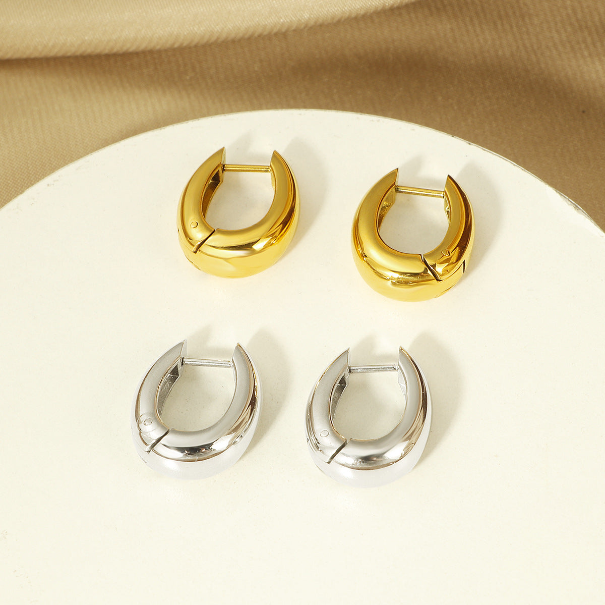 Damen Skulpturale Gold Creolen Shop Nory