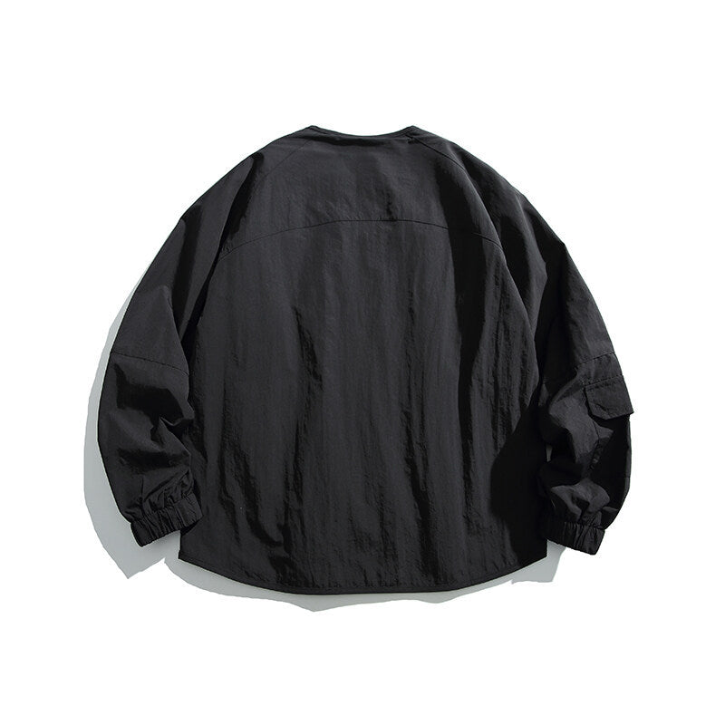Unisex Leichte Oversize‑Überhemdjacke aus technischem Nylonmix mit V‑Ausschnitt und Reißverschlusstaschen Shop Nory