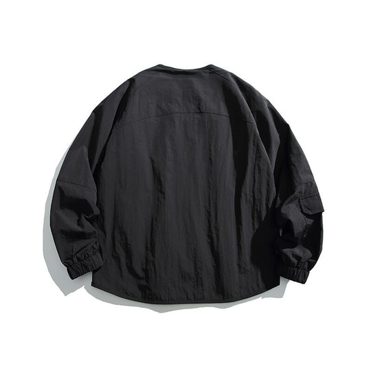 Unisex Leichte Oversize‑Überhemdjacke aus technischem Nylonmix mit V‑Ausschnitt und Reißverschlusstaschen Shop Nory