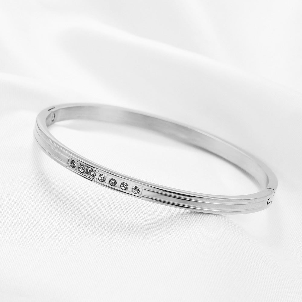 Damen Armreif aus Edelstahl mit filigranem Zirkonia-Besatz Shop Nory