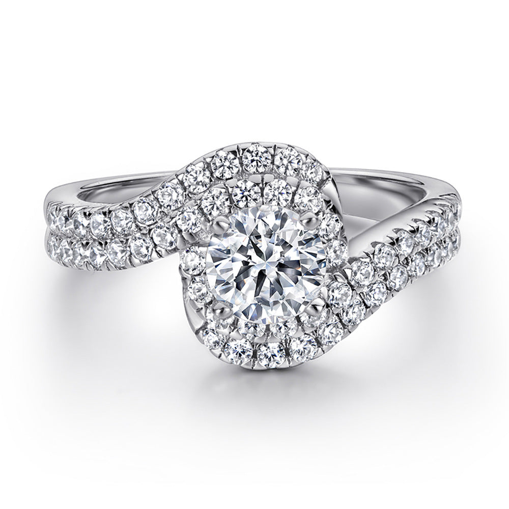 Damenring mit tropfenförmigem Hauptstein und eleganter Zirkonia-Verzierung Shop Nory