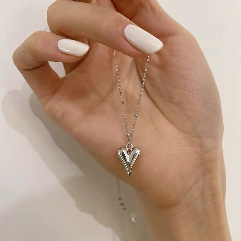 Damen Halskette mit elegantem Herzanhänger aus hochwertigem Edelstahl Shop Nory