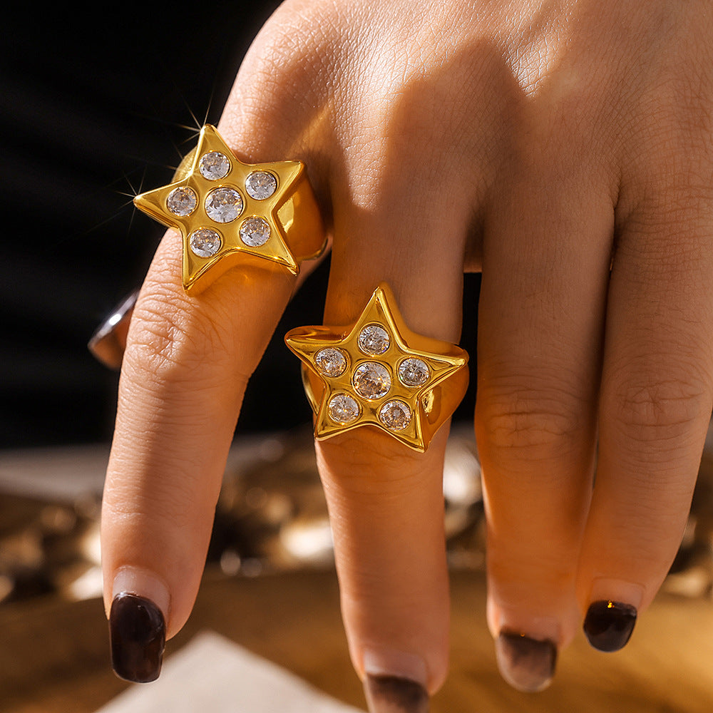 Damen sternförmiger Ring aus Titan mit Zirkonen Shop Nory