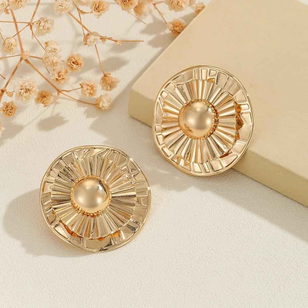 Damen Ohrclips mit kunstvoller goldener Struktur Shop Nory