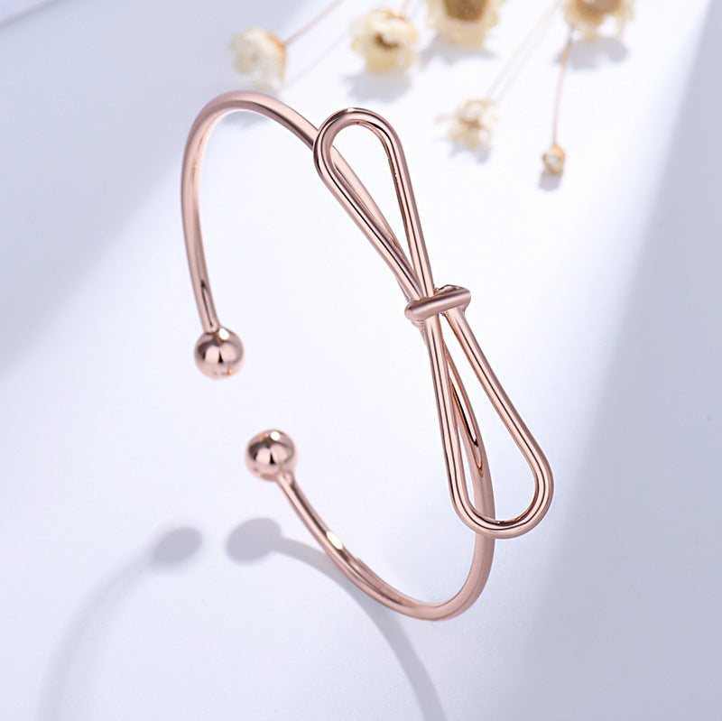 Damen Offenes Armband mit kunstvollem Schleifen-Design Shop Nory