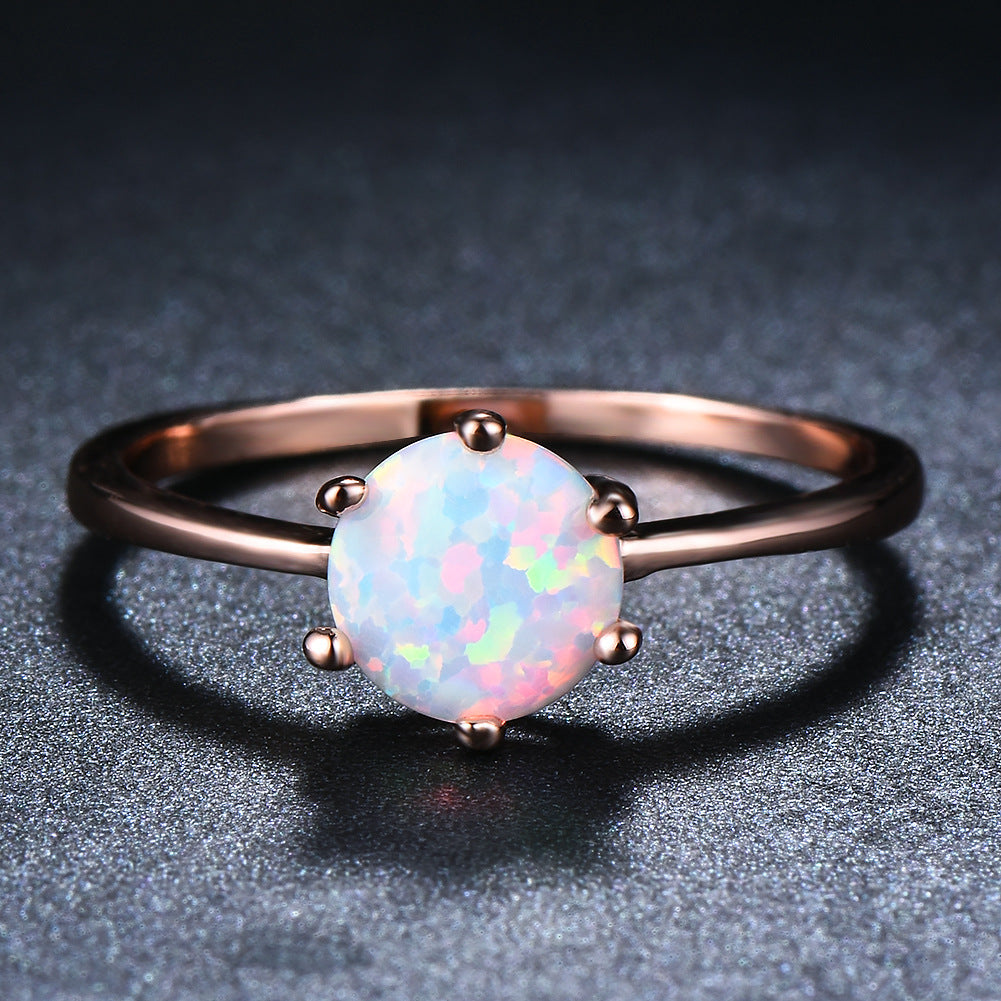 Damen Ring mit schimmerndem Opalstein in eleganter Fassung Shop Nory