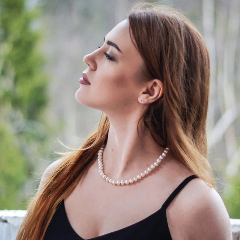 Damen Perlen-Halskette mit zarten goldenen Akzenten Shop Nory