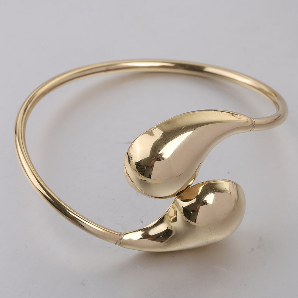 Damen Armreif mit modernem Tropfen-Design und hochwertiger Edelstahloberfläche Shop Nory