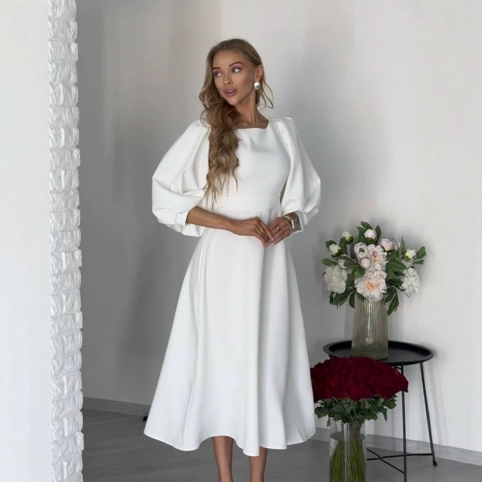 Damen Midikleid mit offenem Rückenausschnitt, voluminösen Puffärmeln und Bindegürtel Shop Nory