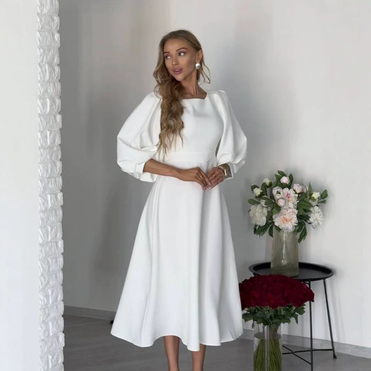 Damen Midikleid mit offenem Rückenausschnitt, voluminösen Puffärmeln und Bindegürtel Shop Nory
