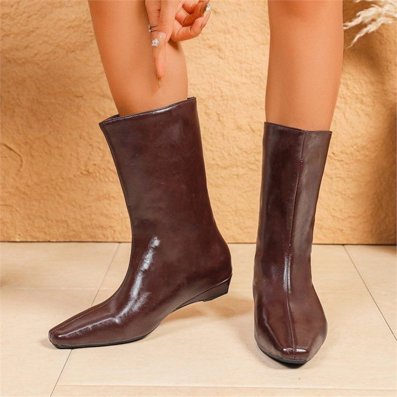 Damen halbhohe Veloursleder-Stiefel mit spitzer Zehenform und flacher Keilsohle Shop Nory