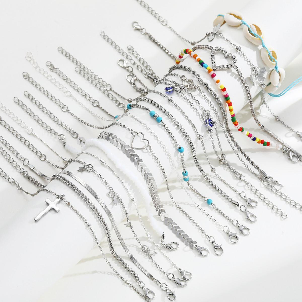 Damen Fußkettchen-Set mit eleganten Anhängern und kreativen Designs Shop Nory