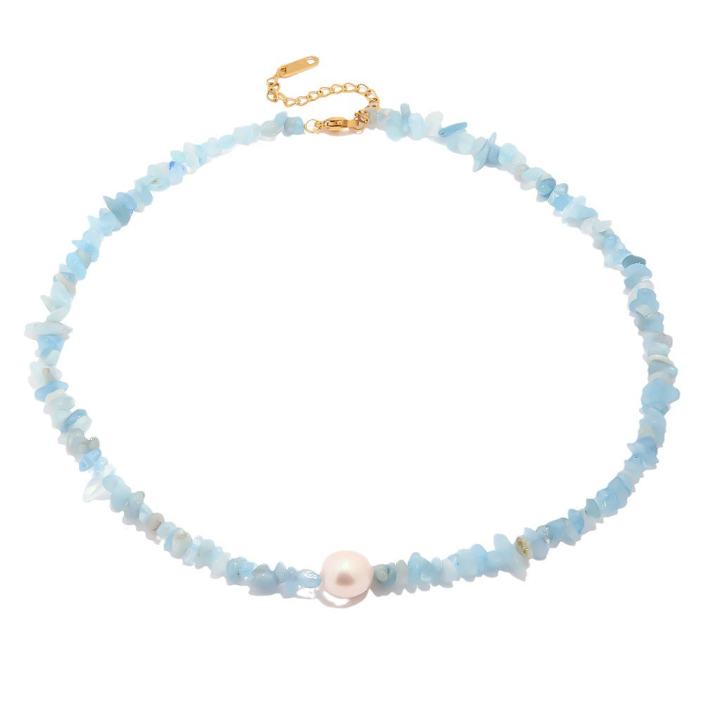 Damen Halskette mit pastelblauen Edelsteinen und einer eleganten Perle Shop Nory